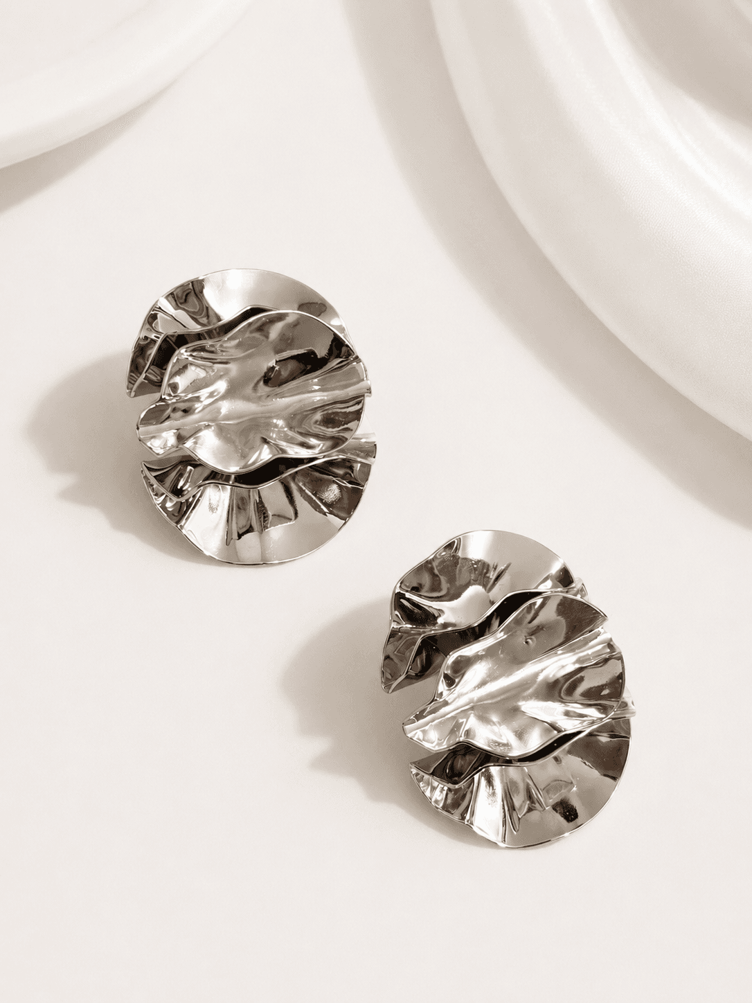 0008 | SCULPTURAL STUD EARRINGS